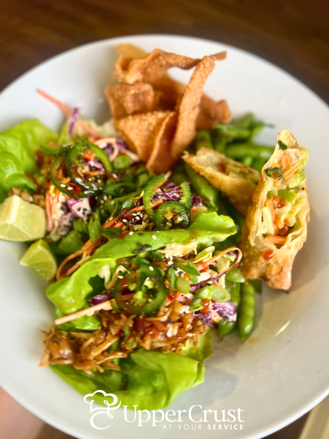 Fresh Asian Inspired Salad with Wonton Strips and an Egg roll